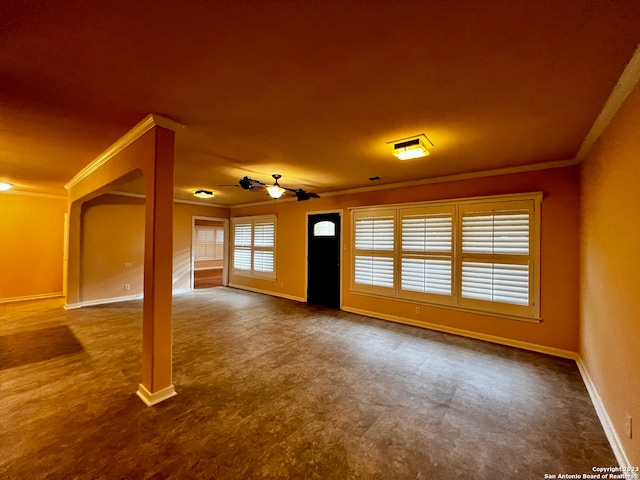 unfurnished living room featuring crown molding