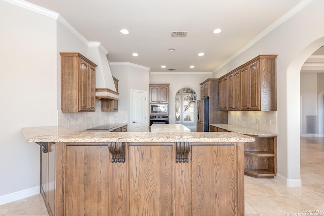 kitchen with arched walkways, a peninsula, ornamental molding, custom exhaust hood, and black appliances