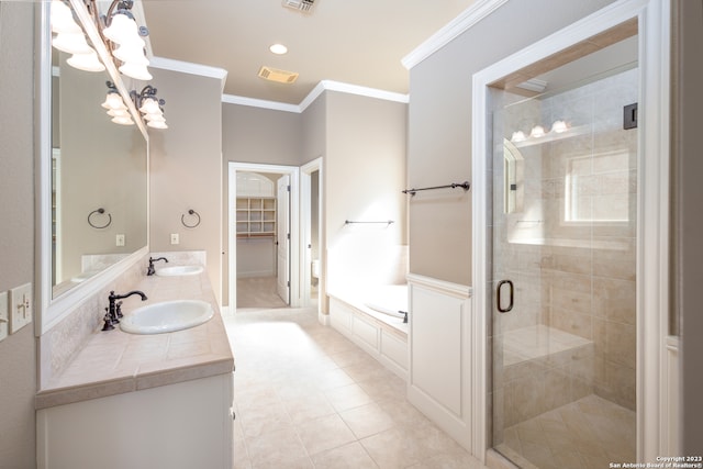 bathroom with tile floors, ornamental molding, an enclosed shower, and double vanity