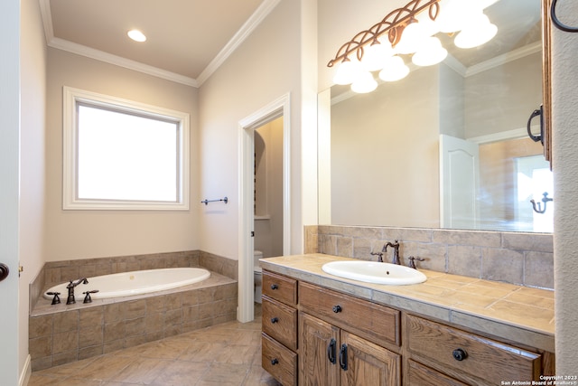 bathroom featuring tiled tub, tile floors, crown molding, and large vanity