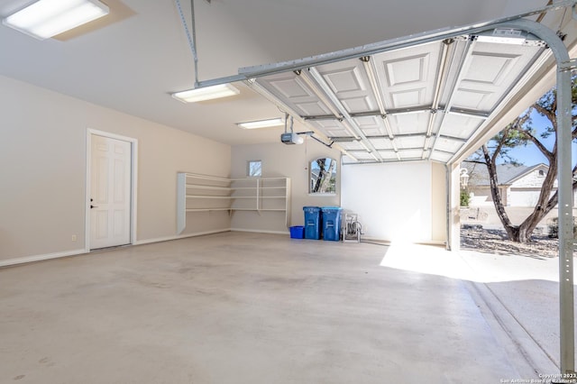 garage featuring a garage door opener