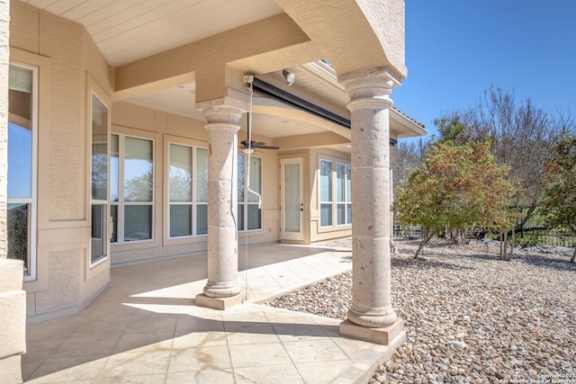 view of terrace featuring ceiling fan