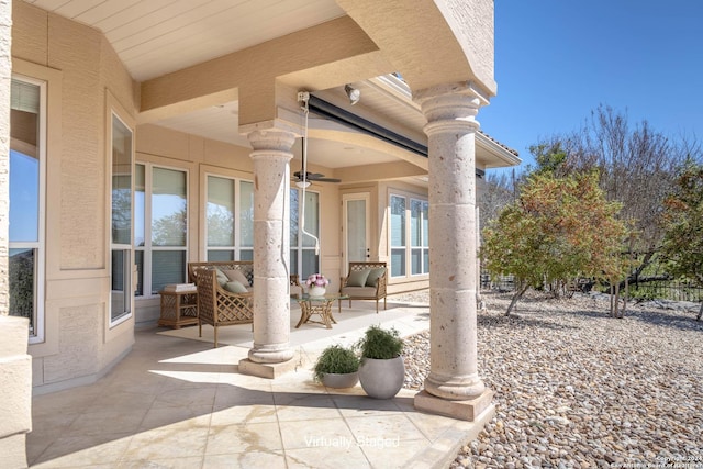 view of patio / terrace with a ceiling fan