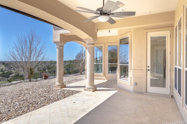 view of terrace featuring ceiling fan