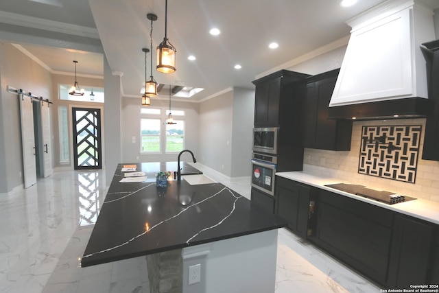 kitchen with a spacious island, premium range hood, decorative light fixtures, appliances with stainless steel finishes, and decorative backsplash