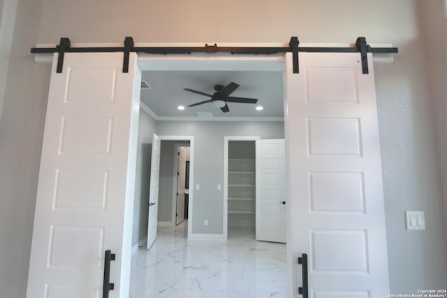 bathroom featuring ornamental molding and ceiling fan