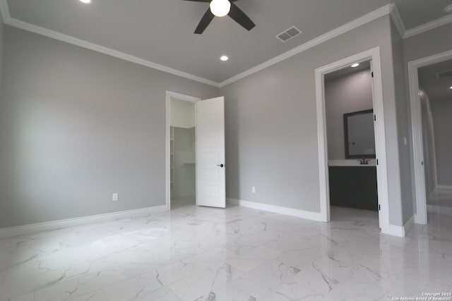 unfurnished bedroom with ornamental molding, ceiling fan, and ensuite bathroom