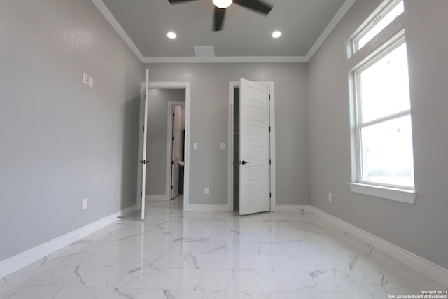 unfurnished bedroom with ornamental molding and ceiling fan