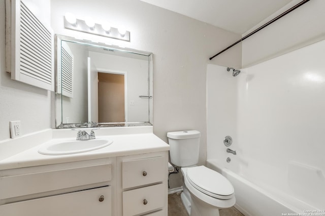 full bathroom with vanity, toilet, and  shower combination