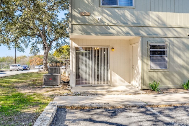 view of exterior entry with cooling unit