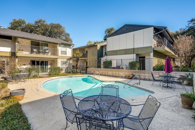 view of pool with a patio area