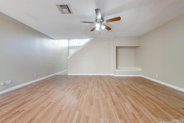 bonus room with ceiling fan and light hardwood / wood-style floors