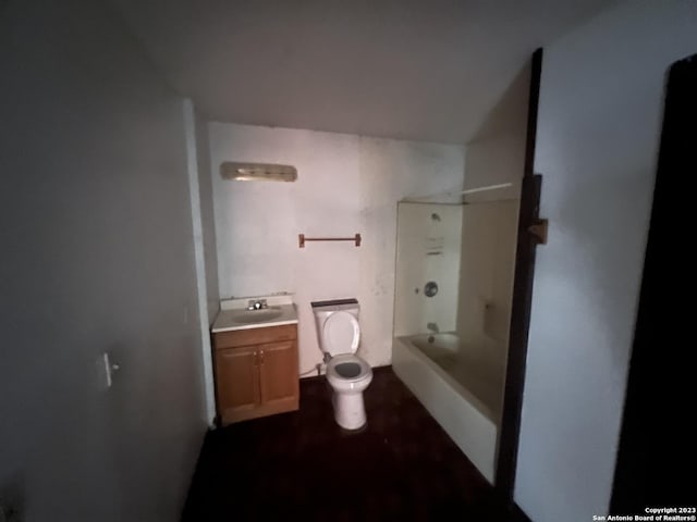 full bathroom featuring toilet, vanity, and shower / bathtub combination