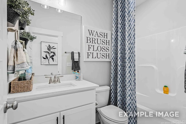 full bathroom with vanity, toilet, and shower / tub combo with curtain