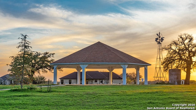 view of property's community featuring a gazebo and a lawn