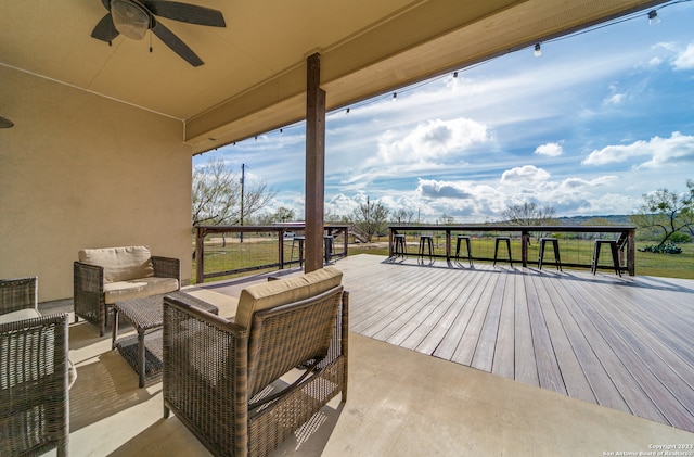 wooden terrace with ceiling fan