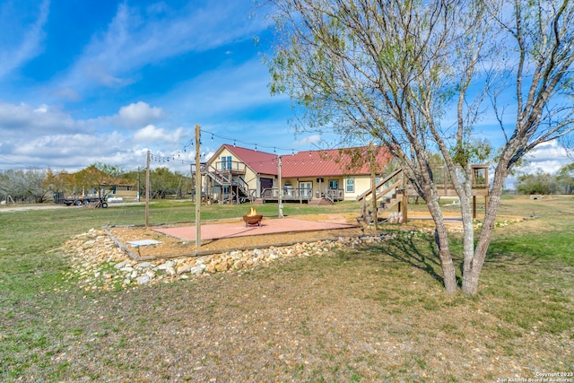 view of yard featuring a wooden deck