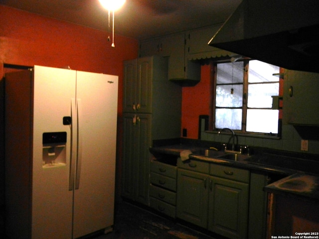 kitchen featuring white refrigerator with ice dispenser, exhaust hood, sink, decorative backsplash, and ceiling fan