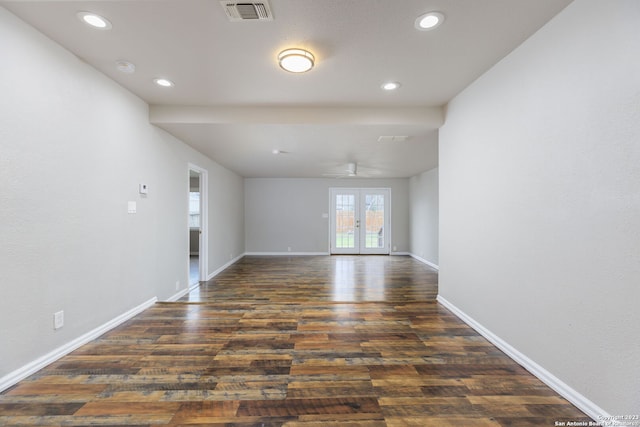 spare room with french doors, dark hardwood / wood-style flooring, and ceiling fan