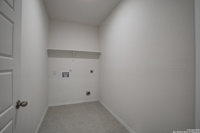 laundry area featuring hookup for a gas dryer, washer hookup, and hookup for an electric dryer