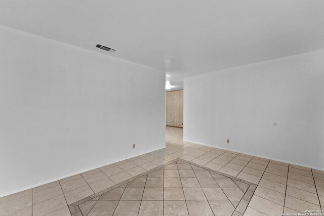 view of tiled spare room