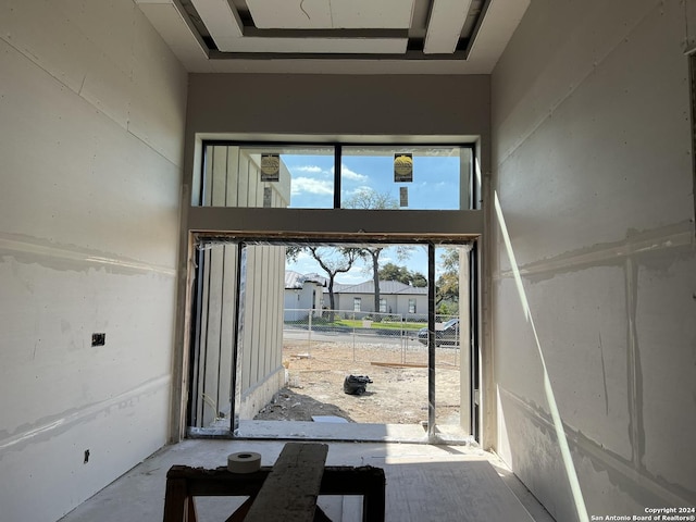 interior space with a towering ceiling