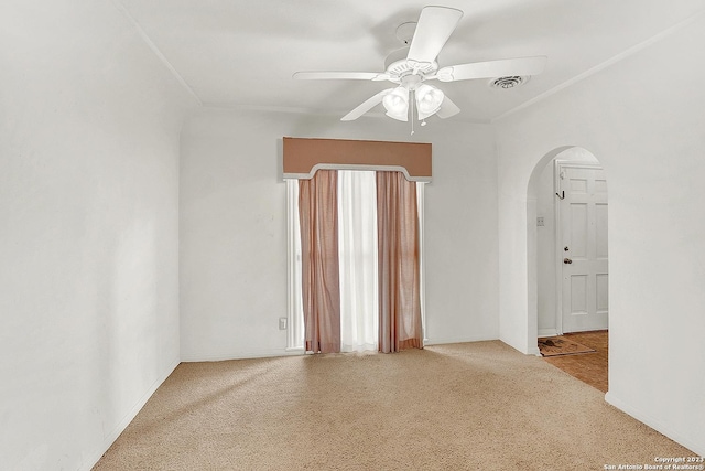 carpeted empty room with ceiling fan