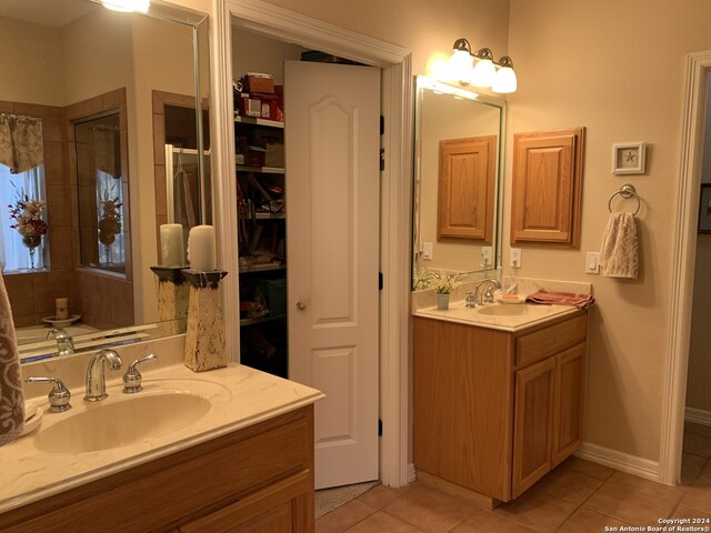 bathroom with vanity and tile patterned floors