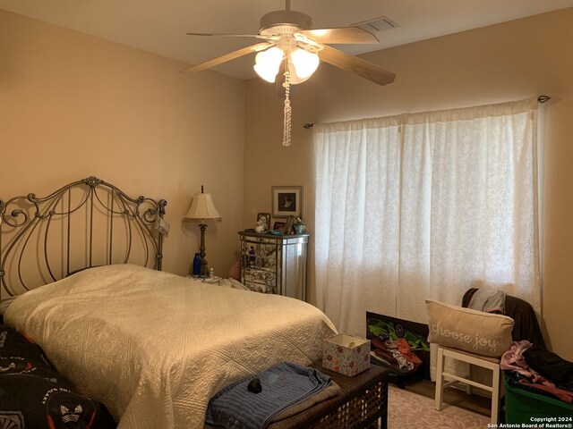 bedroom featuring ceiling fan