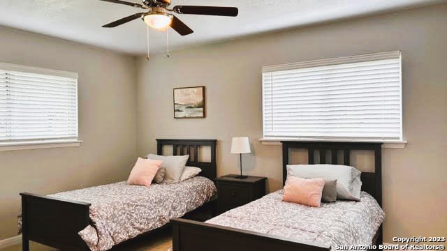 bedroom featuring ceiling fan