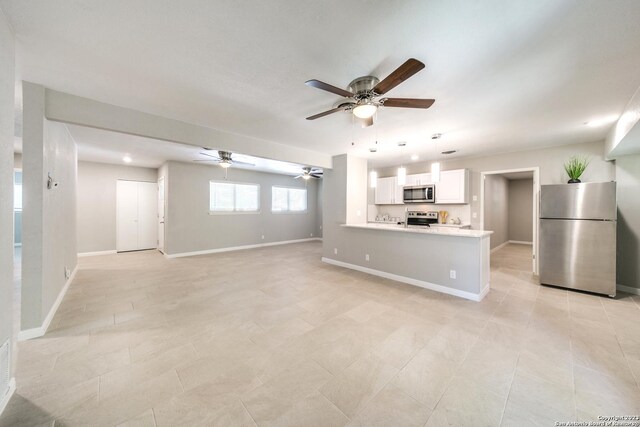 kitchen with sink, white cabinetry, dishwasher, and ceiling fan