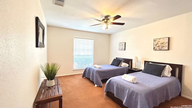 bedroom with carpet and ceiling fan