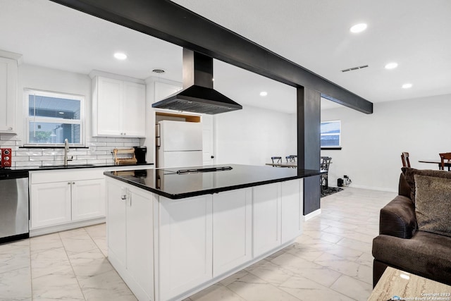 kitchen with sink, white refrigerator, white cabinets, island exhaust hood, and stainless steel dishwasher