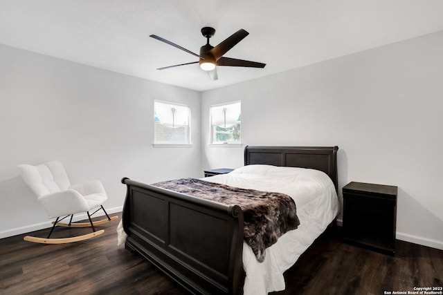 bedroom featuring dark wood-type flooring and ceiling fan