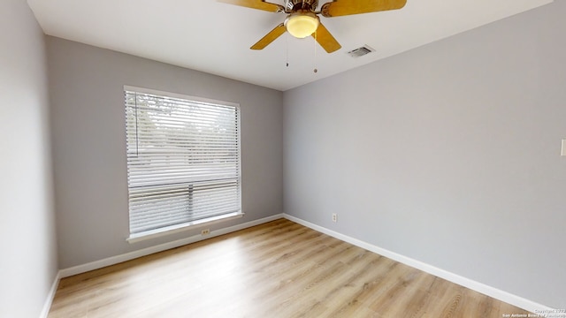 unfurnished room featuring ceiling fan and light hardwood / wood-style flooring