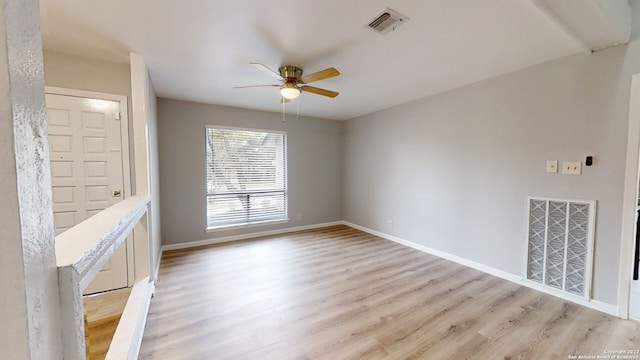 unfurnished room featuring light hardwood / wood-style floors and ceiling fan