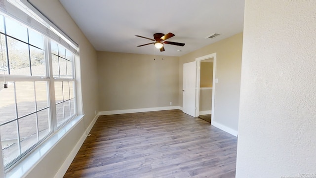 spare room with ceiling fan and light hardwood / wood-style flooring