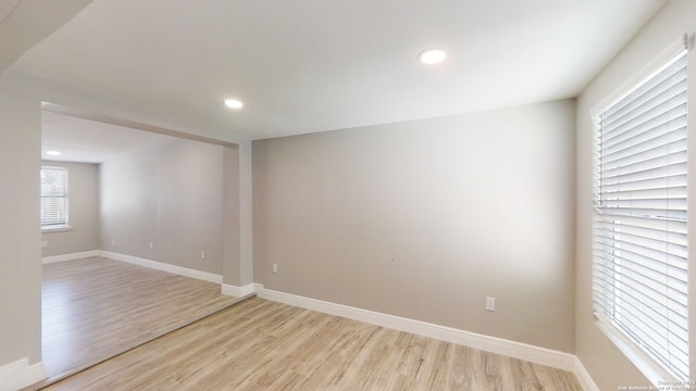 unfurnished room featuring light hardwood / wood-style flooring