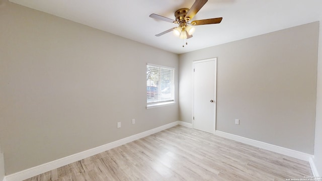 unfurnished room with ceiling fan and light hardwood / wood-style floors