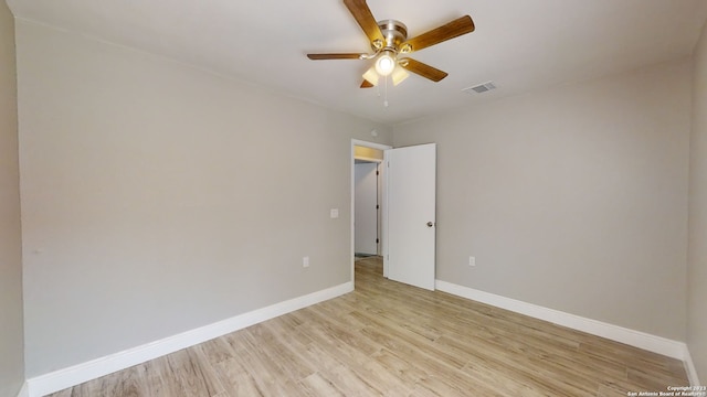 unfurnished room featuring ceiling fan and light hardwood / wood-style flooring