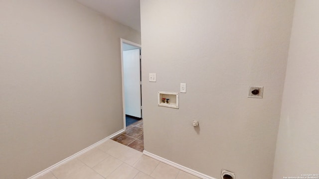 washroom featuring electric dryer hookup, washer hookup, hookup for a gas dryer, and tile patterned floors