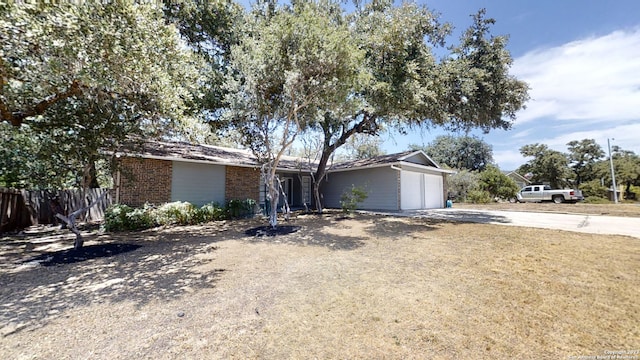 ranch-style home with a garage