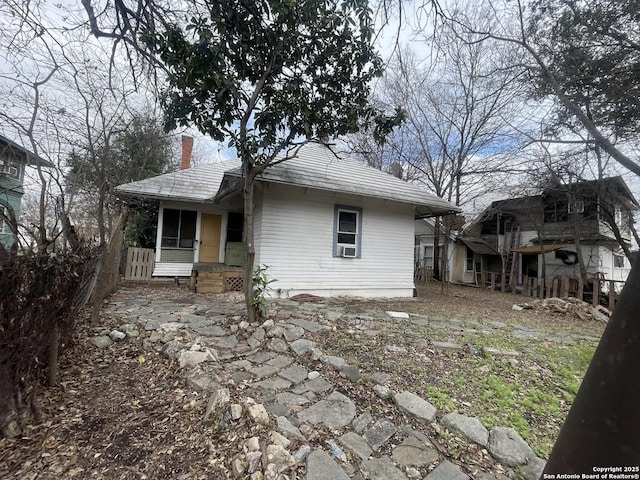 view of front of home with cooling unit