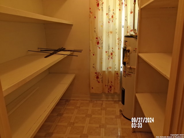 spacious closet with electric water heater