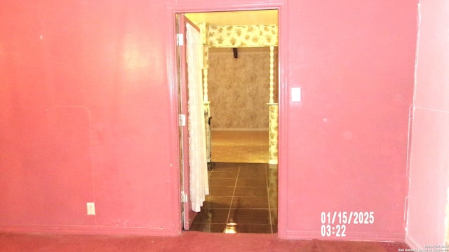 corridor featuring tile patterned floors