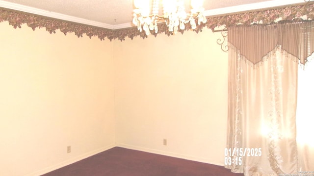 empty room featuring baseboards, a notable chandelier, crown molding, and a textured ceiling