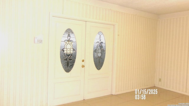 view of tiled entrance foyer