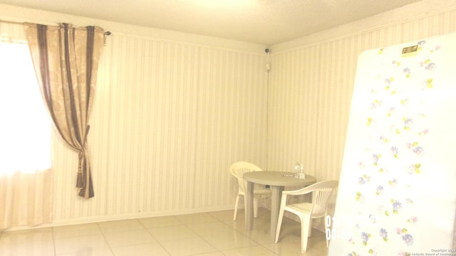 dining room with tile patterned flooring