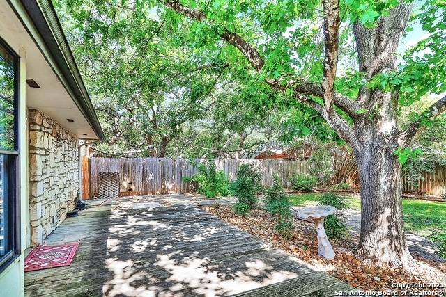 view of yard with a wooden deck