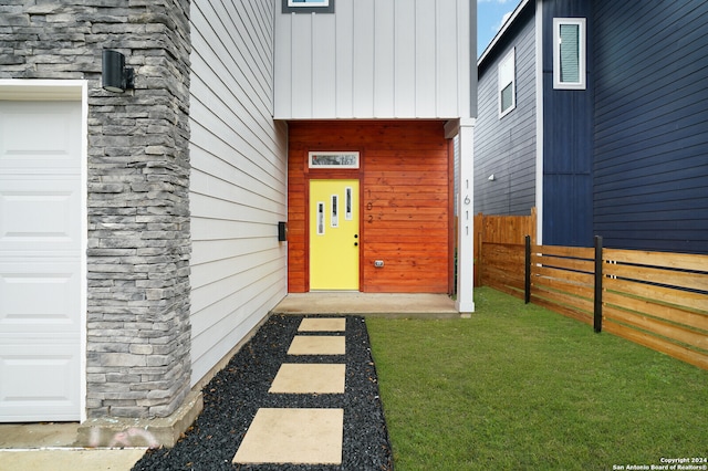 property entrance featuring a garage